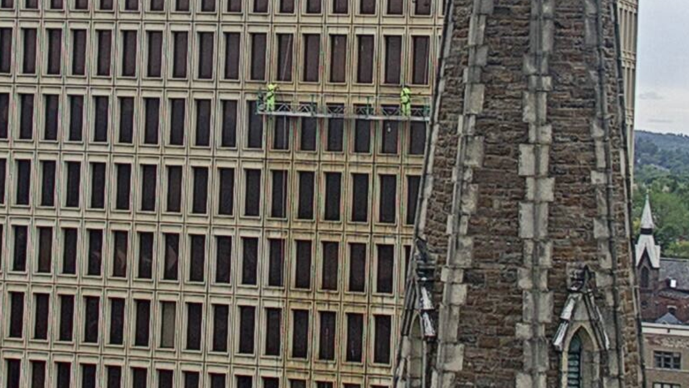 Workers on the north face of the State Building